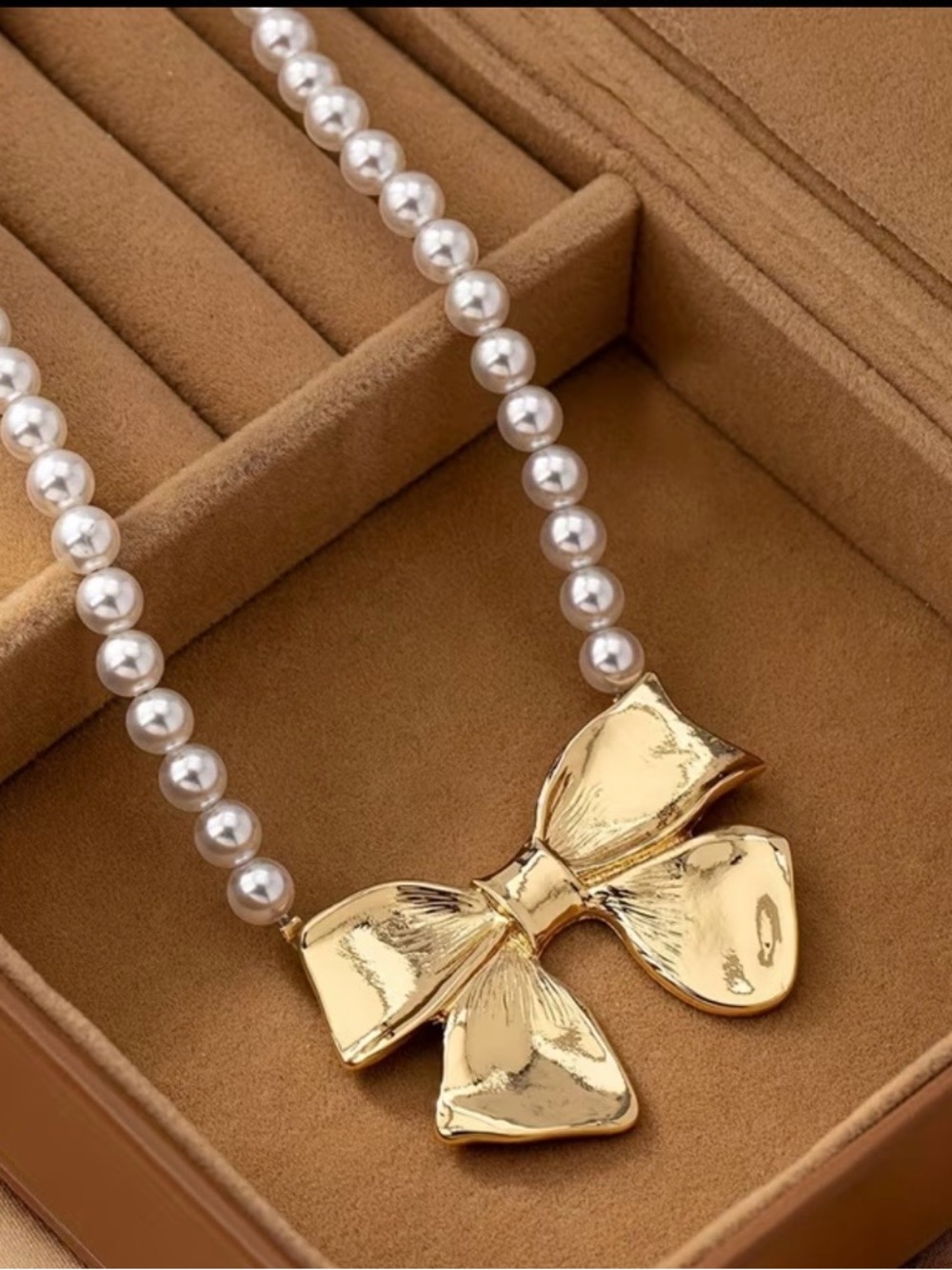 Goldtone Bow Faux Pearl Necklace - Picture 3 of 4